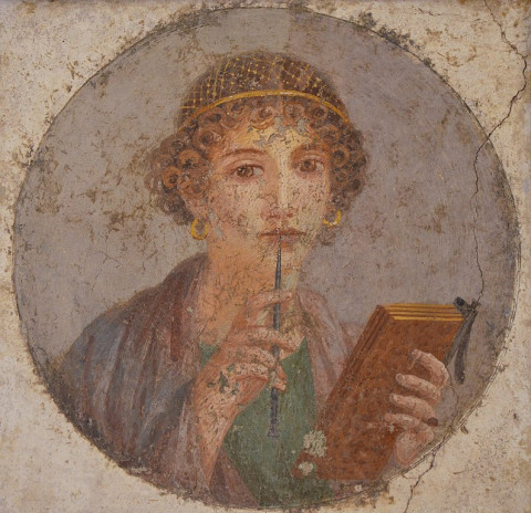 Fresco van een vrouw met wastablet en stylus (soms Sappho genoemd) uit Pompeii.